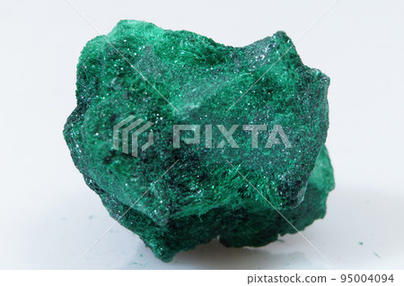 Natural gemstone green malachite on white background 95004094