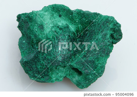 Natural gemstone green malachite on white background 95004096