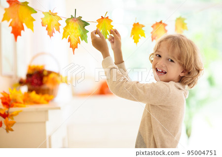 Autumn home decoration. Family decorating house. Autumn home decoration. Family decorating house. 95004751