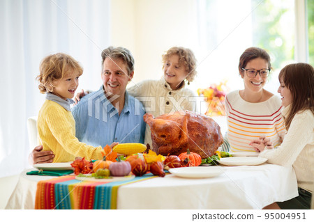 Thanksgiving family dinner. Roasted turkey meal. 95004951