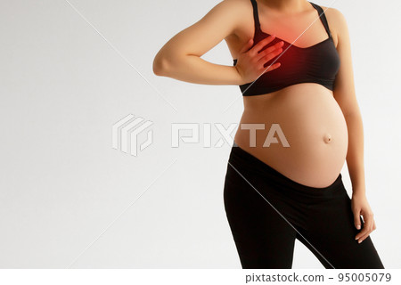 Closeup cropped portrait young woman with breast 95005079