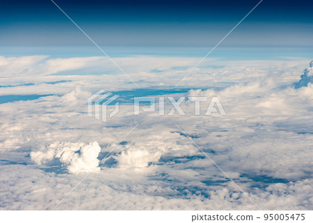 Clouds from the plane window 95005475