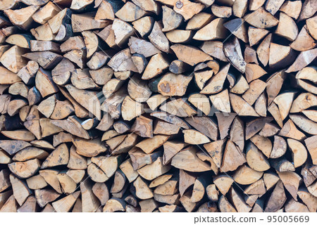 Stacked stack of firewood Stacked stack of firewood 95005669