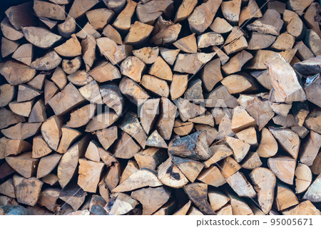 Stacked stack of firewood Stacked stack of firewood 95005671