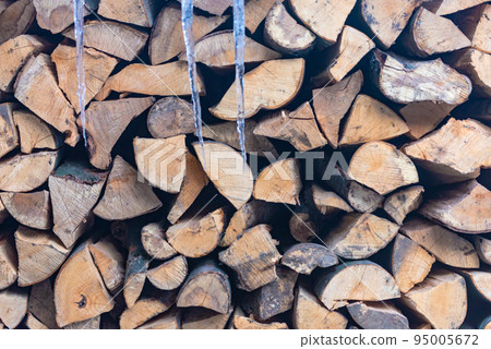 Stacked stack of firewood Stacked stack of firewood 95005672