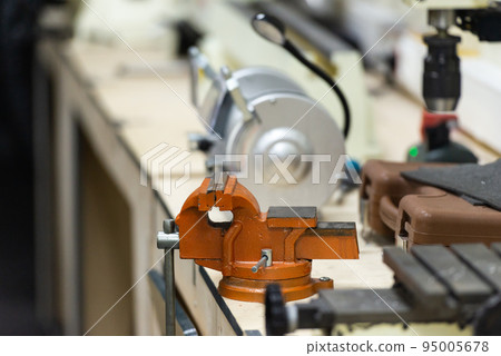 Table in the workshop with a vise Table in the workshop with a vise 95005678