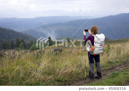 tourist girl at the Carpathians tourist girl at the Carpathians 95008316