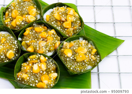 Thai dessert coconut pudding with tapioca pearl or sago and corn 95009793