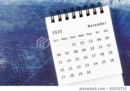 The November 2022 Monthly desk calendar for 2022 year on old blue wooden background. The November 2022 Monthly desk calendar for 2022 year on old blue wooden background. 95010731
