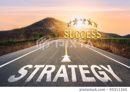 Strategy written on asphalt road in sunset concept of goals and challenges or career path success business opportunity and change. Strategy written on asphalt road in sunset concept of goals and challenges or career path success business opportunity and change. 95011308