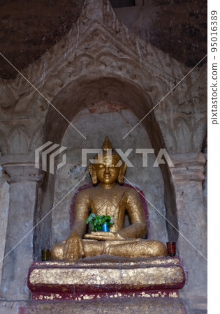 Buddha statues inside the Shwe Gudji temple in Bagan, Myanmar 95016389