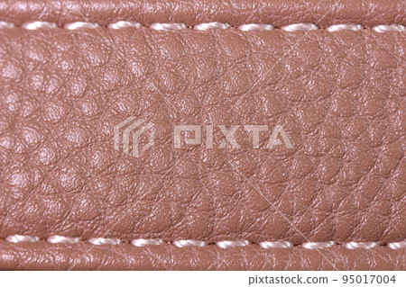 Leather belt stitching close-up Leather belt stitching close-up 95017004