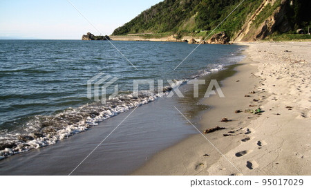 Cape Yahiko, Sea of Japan, sandy beach and blue sky 95017029