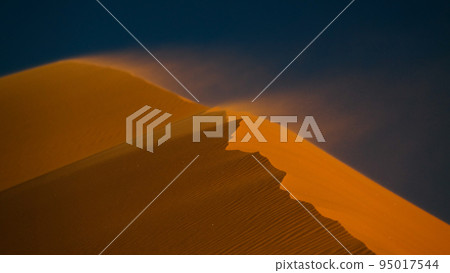 Sunset windy view to Tin Merzouga dune at Tassili nAjjer national park in Algeria Sunset windy view to Tin Merzouga dune at Tassili nAjjer national park in Algeria 95017544