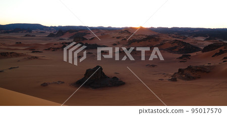 Sunset view to Tin Merzouga dune at Tassili nAjjer national park in Algeria 95017570