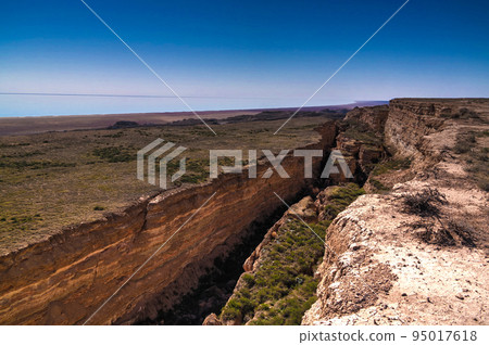 Panorama view to Aral sea from the rim of Plateau Ustyurt near Aktumsuk cape , Karakalpakstan, Uzbekistan 95017618