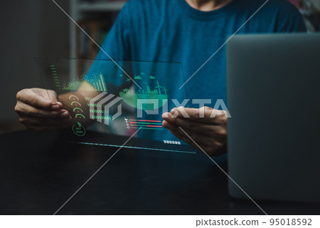 Businessman touching screen virtual icon eco energy sustainable environment digital technology concept. 95018592