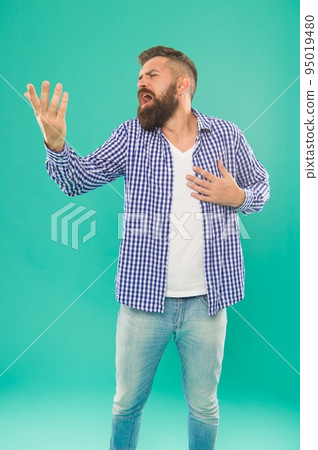 listen to my song. caucasian guy with beard and mustache singing serenade. 95019480
