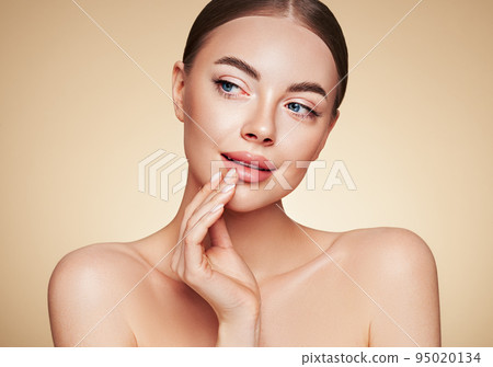 Portrait beautiful young woman with clean fresh skin 95020134