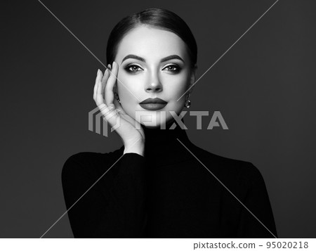 Beautiful woman face with perfect makeup Beautiful woman face with perfect makeup 95020218