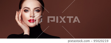 Beautiful woman face with perfect makeup Beautiful woman face with perfect makeup 95020219