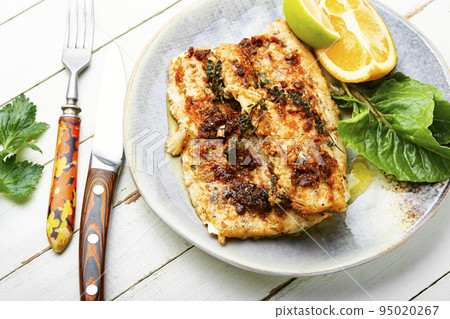 Roasted fish fillets. 95020267