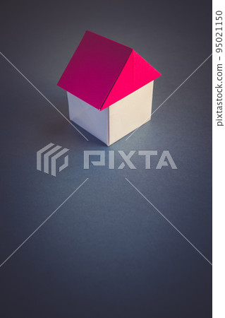 White and red paper house origami isolated on grey background White and red paper house origami isolated on grey background 95021150
