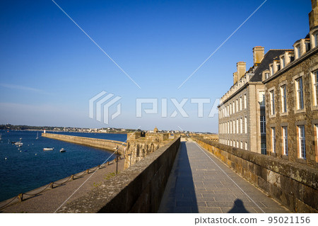 Saint-Malo lighthouse and pier view from the city fortifications, Brittany, France Saint-Malo lighthouse and pier view from the city fortifications, Brittany, France 95021156
