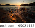 The sea stained in the morning sun 95021432