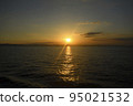 Sunset over the sea seen from the sea 95021532