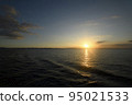 Sunset over the sea seen from the sea 95021533