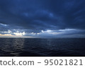 Sunset over the sea and clouds 95021821