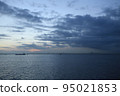 Sunset over the sea, clouds and a ship 95021853