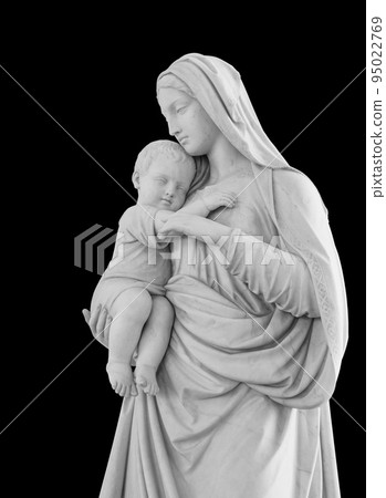 Virgin Mary and child Christ in her arms statue isolated on white background with clipping path. Madonna with baby sculpture 95022769