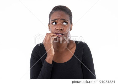 Portrait of anxious African American woman Portrait of anxious African American woman 95023824