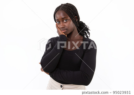 Portrait of bored young woman looking at camera 95023931