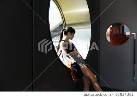 Cool image of a woman in sports fashion 95024391