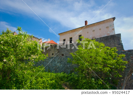 Old medieval castle with towers 95024417
