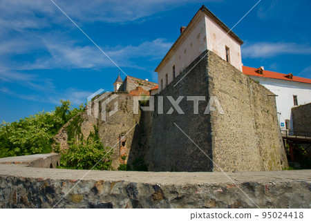 Old medieval castle with towers 95024418