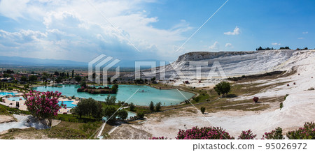 White travertine terraces and blue water pools in Pamukkale, Hierapolis, Turkey White travertine terraces and blue water pools in Pamukkale, Hierapolis, Turkey 95026972