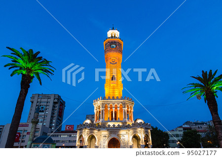 Turkey The clock tower of the symbol of Izmir lit up in Konak Square at night 95027177