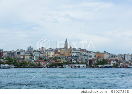 The streets of the new city of Istanbul and the Galata Tower on the hill in the Galata district, Turkey The streets of the new city of Istanbul and the Galata Tower on the hill in the Galata district, Turkey 95027258