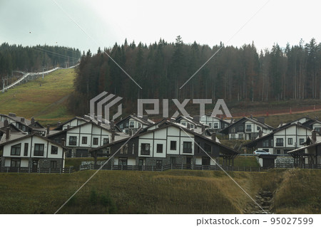 Houses for tourists in mountain resort in autumn day 95027599