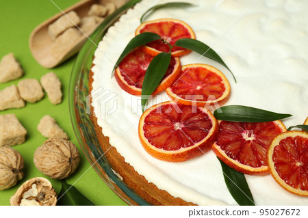 Concept of tasty dessert with meringue pie with citrus, closeup Concept of tasty dessert with meringue pie with citrus, closeup 95027672