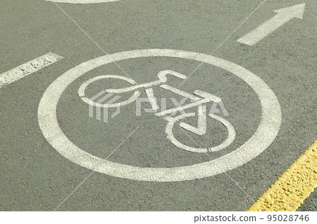 Bicycle lane sign on the asphalt road Bicycle lane sign on the asphalt road 95028746