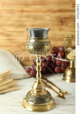 Concept or composition of Eucharist with different accessories Concept or composition of Eucharist with different accessories 95029031