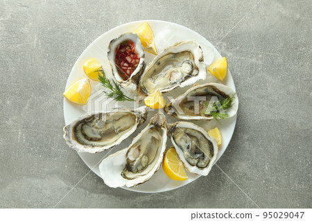 Concept of delicious seafood, oysters, top view 95029047