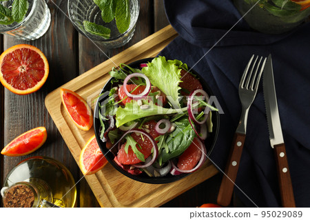 Concept of tasty food with salad with red orange 95029089