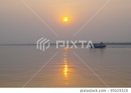 Sunset at Sundarbans National Park, a World Heritage Site, India Sunset at Sundarbans National Park, a World Heritage Site, India 95029328
