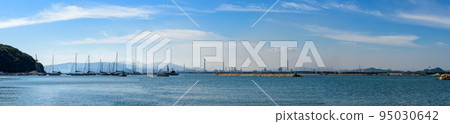 Panoramic view of the Seto Inland Sea, from Kasaoka City's fishing port to Fukuyama City's ironworks 95030642